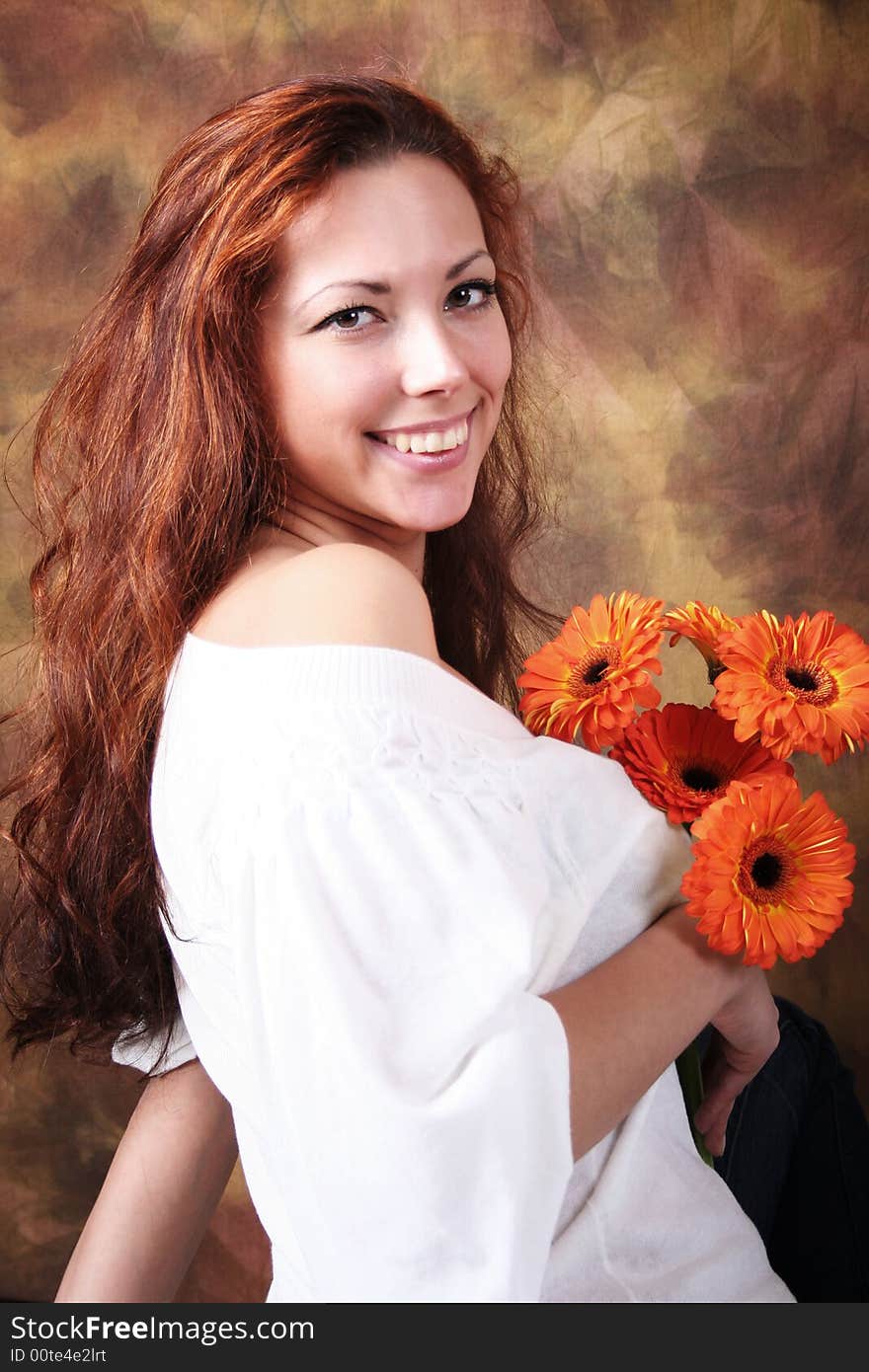 Beautyful young girl with bunch of flowers. Beautyful young girl with bunch of flowers