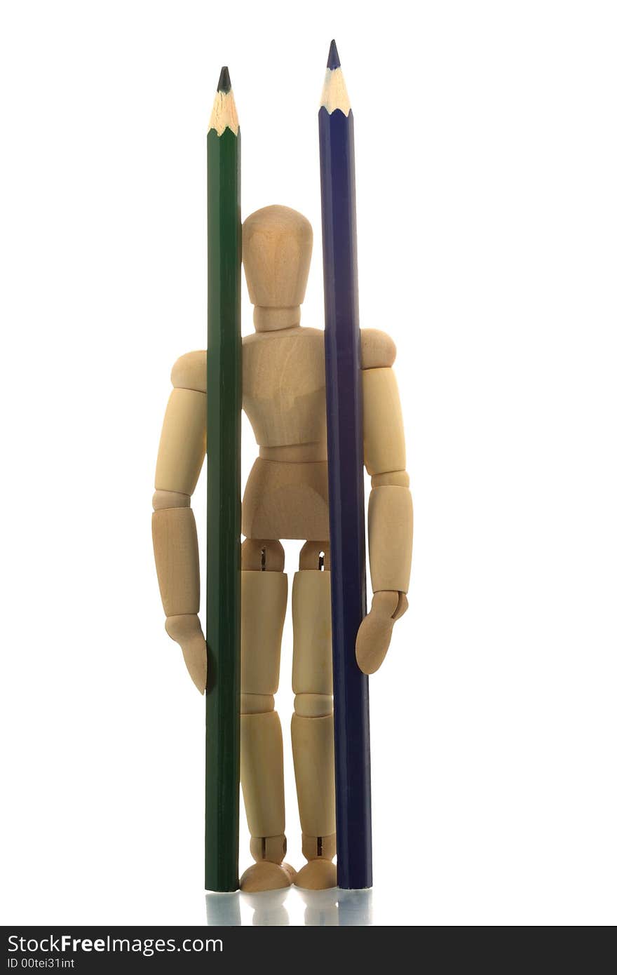 Manikin standing with blue and green pencils. Manikin standing with blue and green pencils