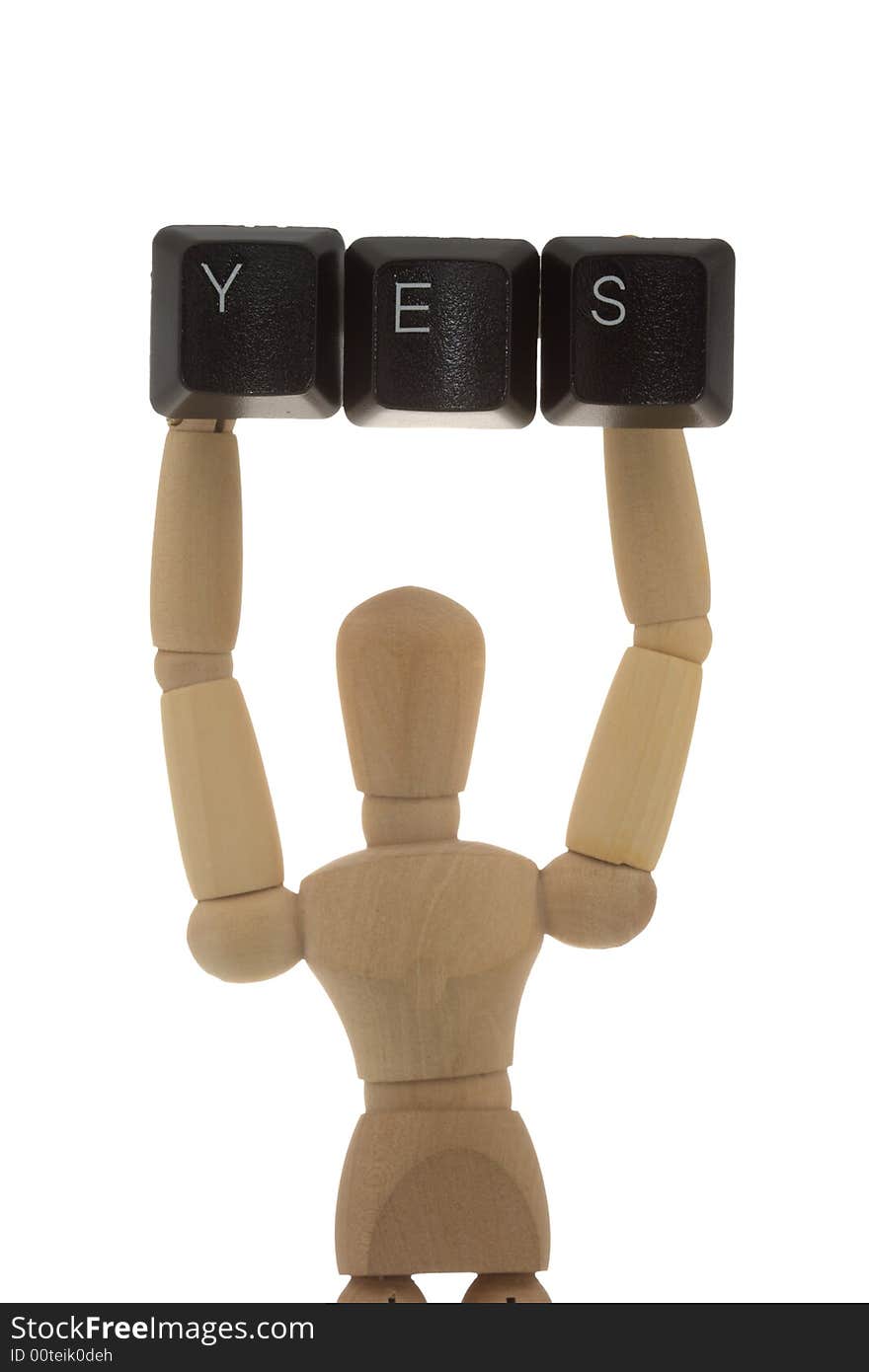 Manikin showing YES keys high up. Message concept. Manikin showing YES keys high up. Message concept.