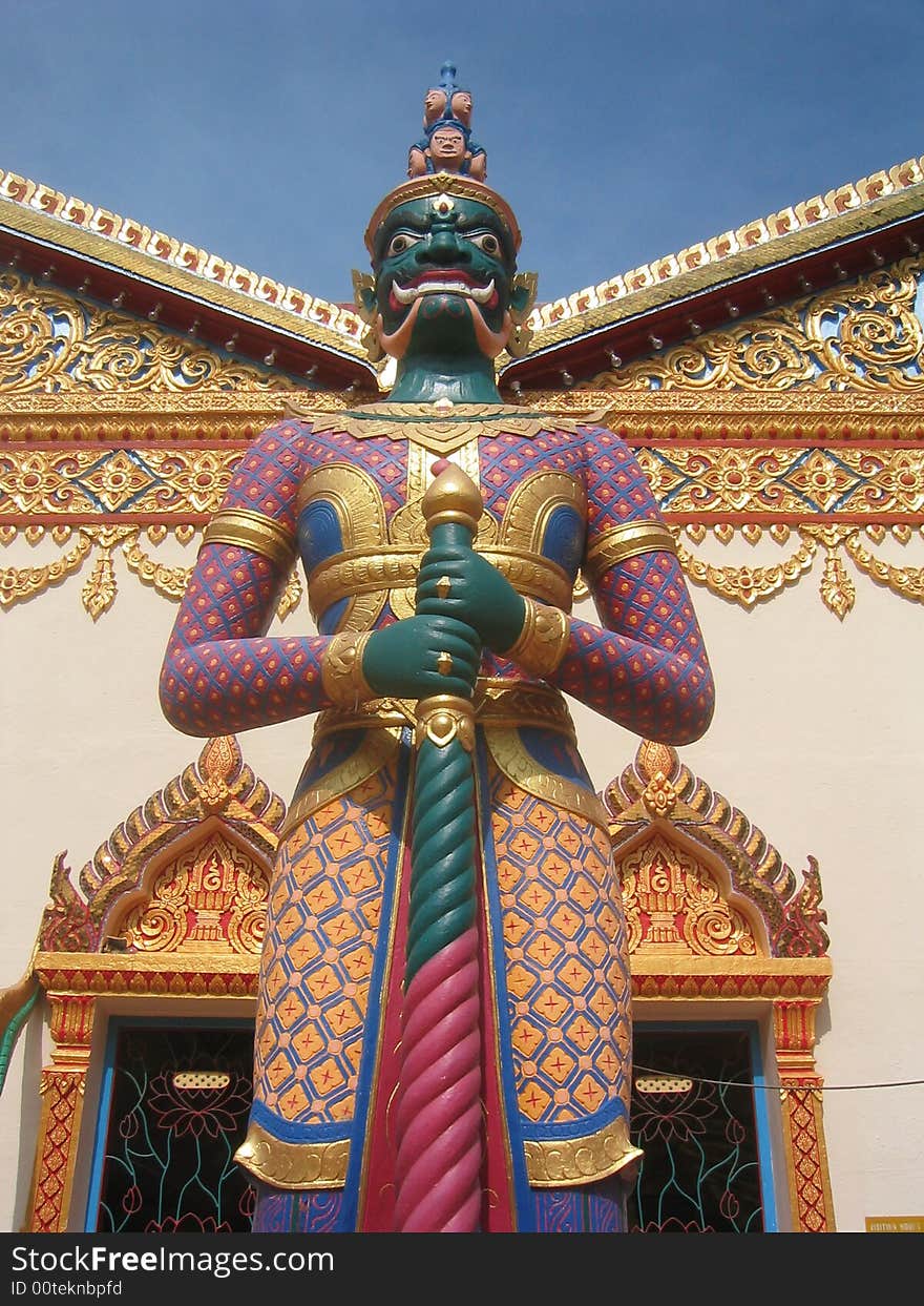 Statue standing outside Wat Chayamangkalaram Thai temple. Statue standing outside Wat Chayamangkalaram Thai temple