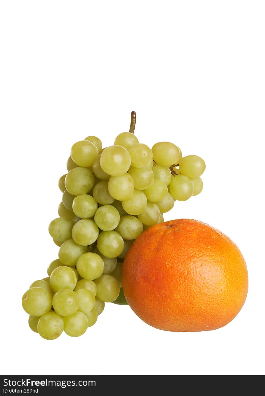 Grapes and grapefruit on white