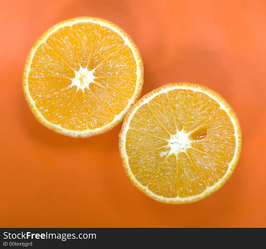 Two delicious half orange isolated