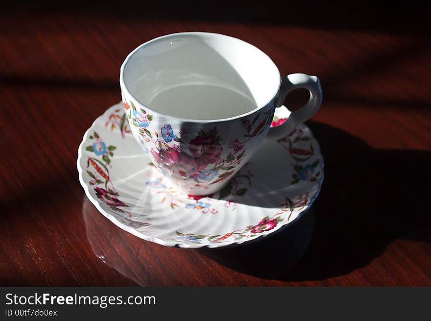 Fine china teacup on a wooden table