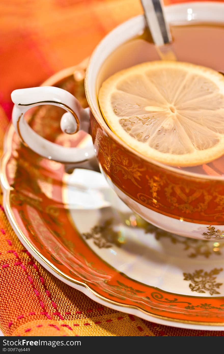 Cup of tea, red still life