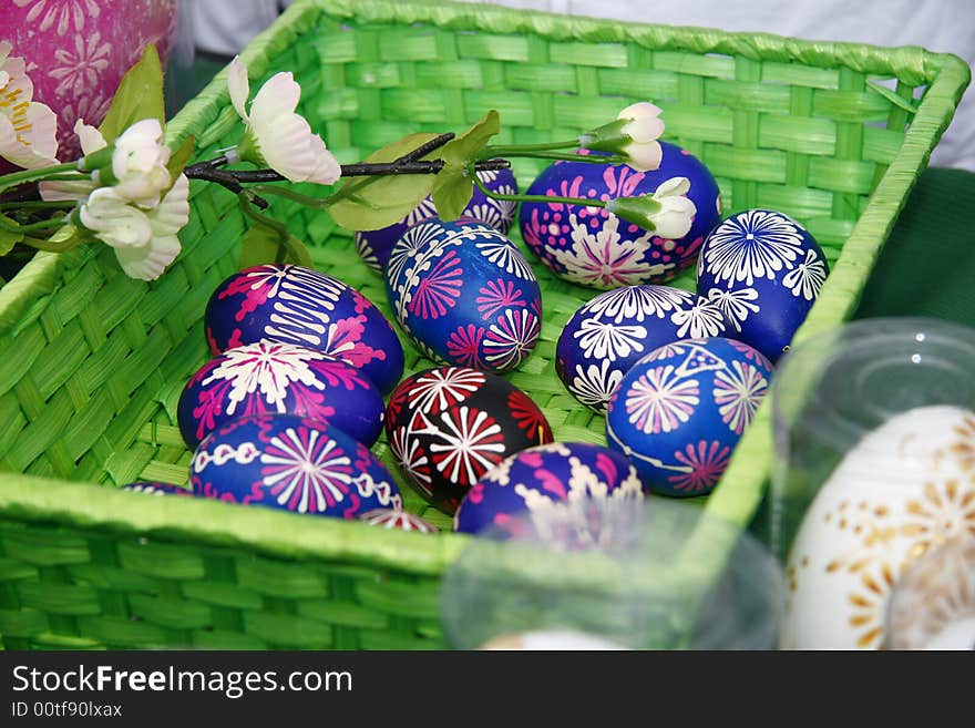 Detail of basket of colored easter eggs. Detail of basket of colored easter eggs