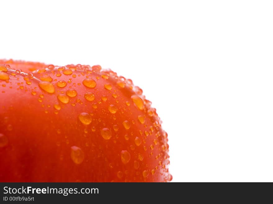 Macro of a fresh red tomato on a white background