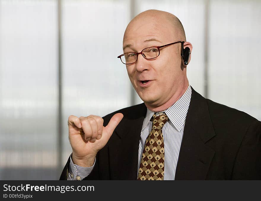 Businessman with a hands-free phone