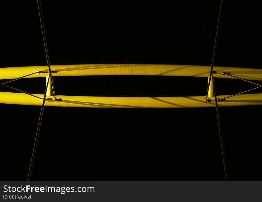 Part of modern, small suspension bridge in Wroclaw (Poland) at night. Part of modern, small suspension bridge in Wroclaw (Poland) at night.