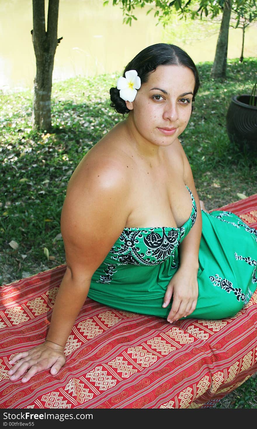 Portrait of a pretty woman at a tropical spa.