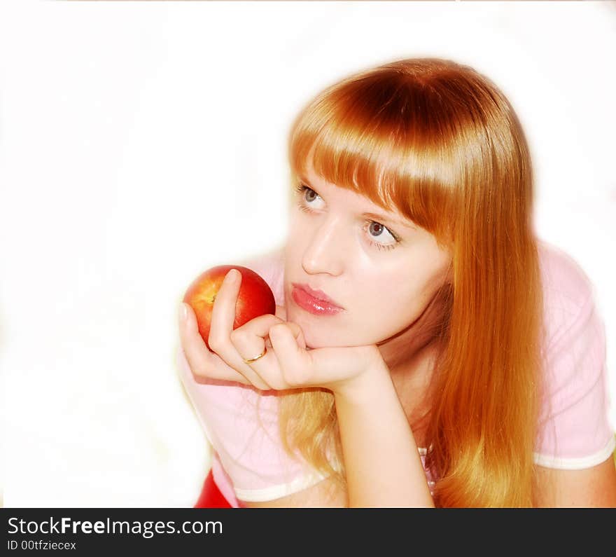 The photo of blonde girl with flower