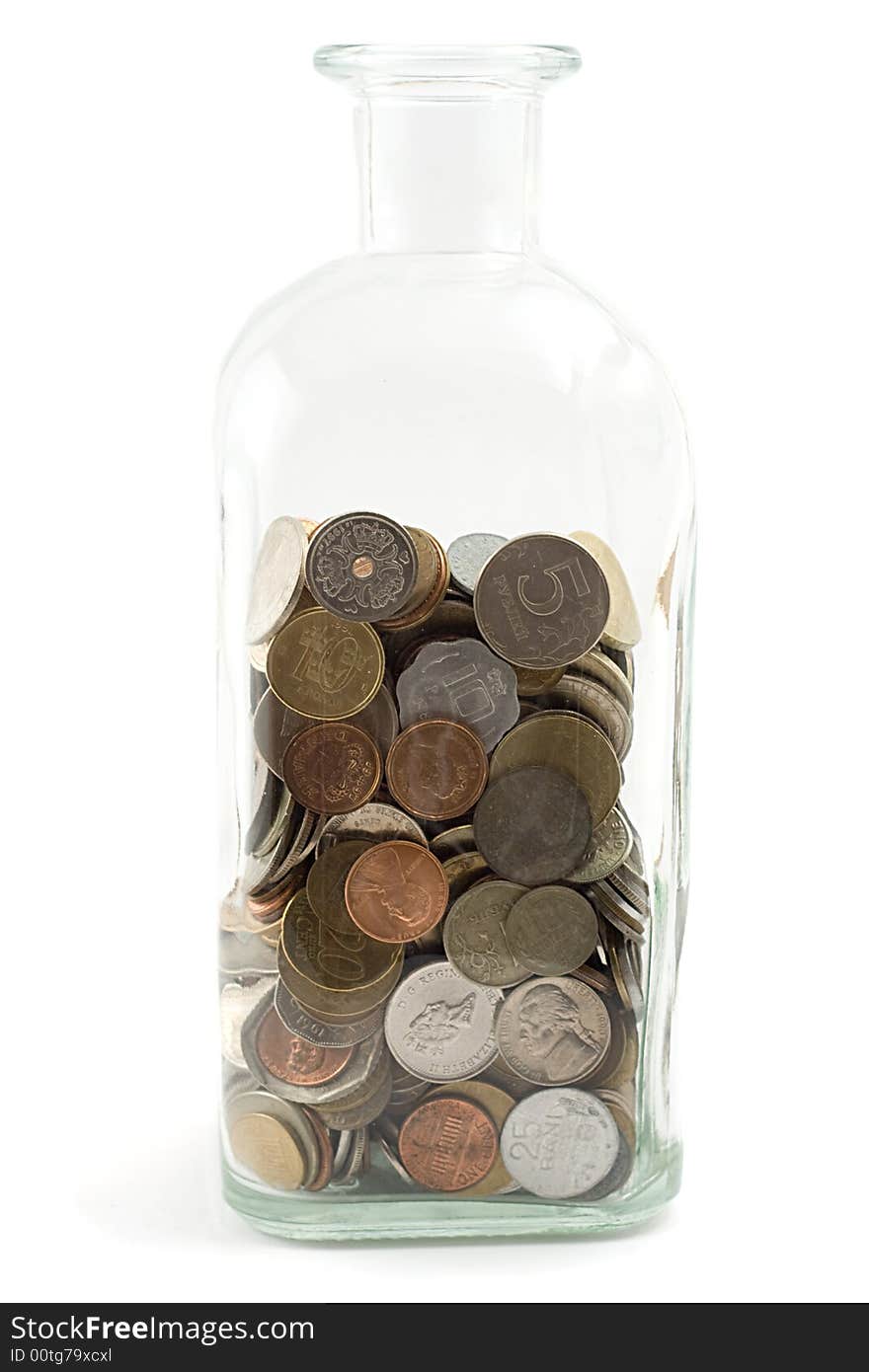 Jar filled with coins, shot on white. Jar filled with coins, shot on white