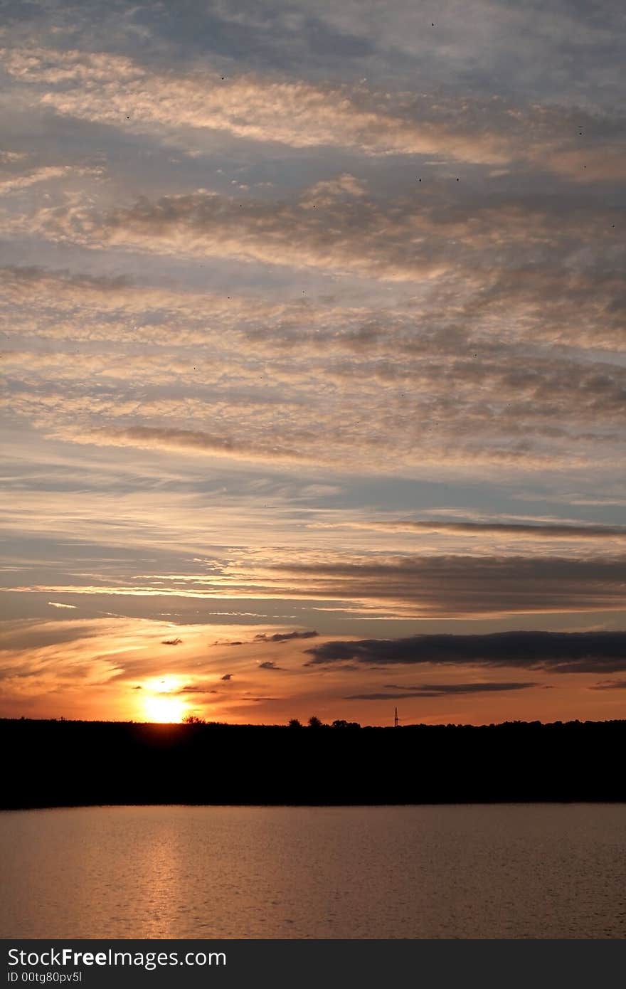 Sunset Colors Reflecting On The Lake