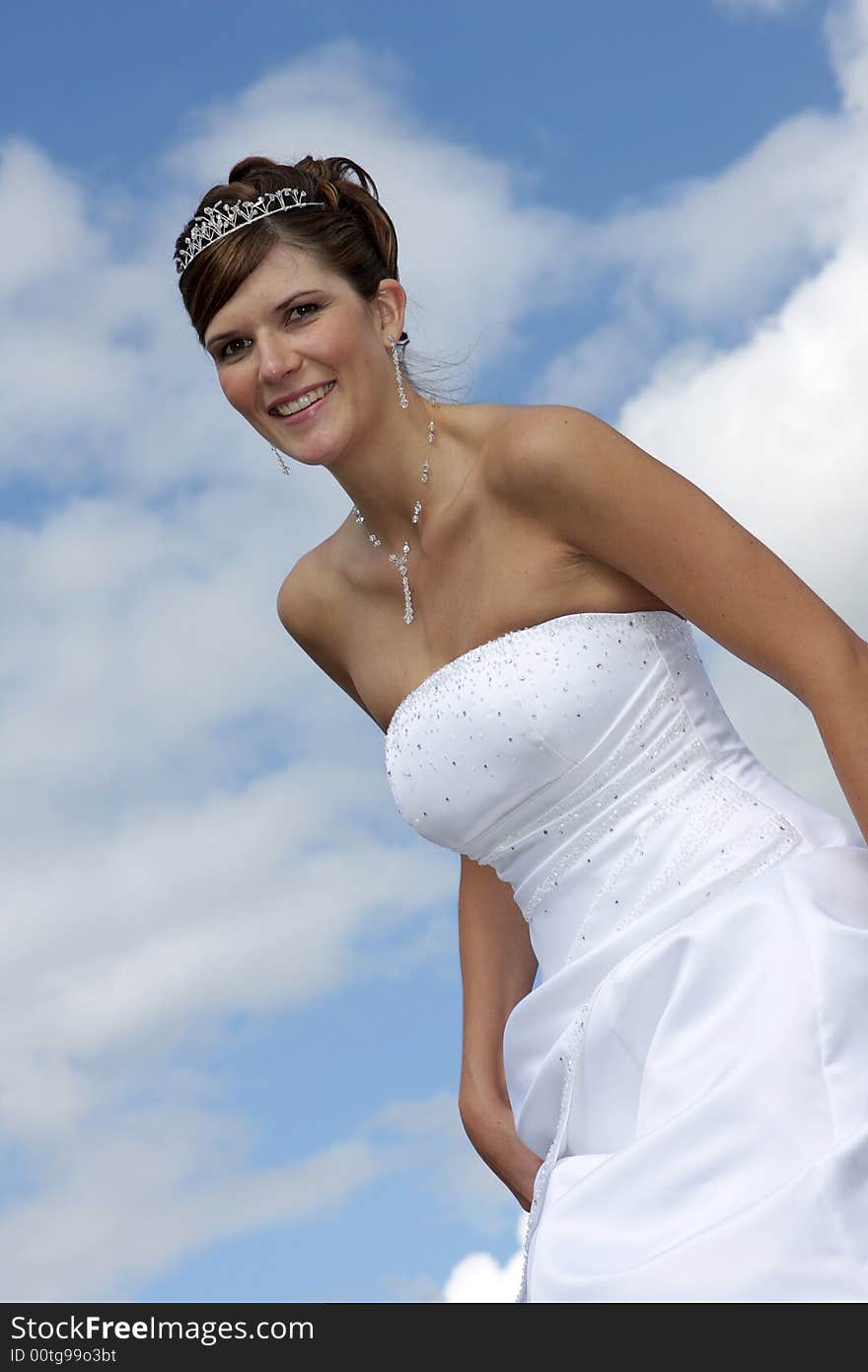 A bride in her white wedding dress. A bride in her white wedding dress