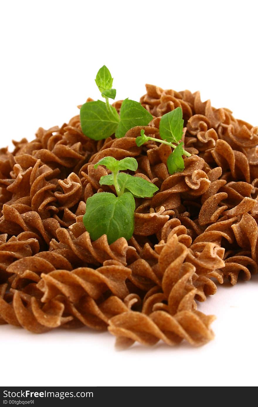 Fusilli twirls pasta Italian food background