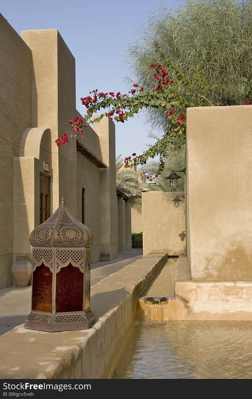 Arabic village lane with water stream and old arabic lamp. Arabic village lane with water stream and old arabic lamp