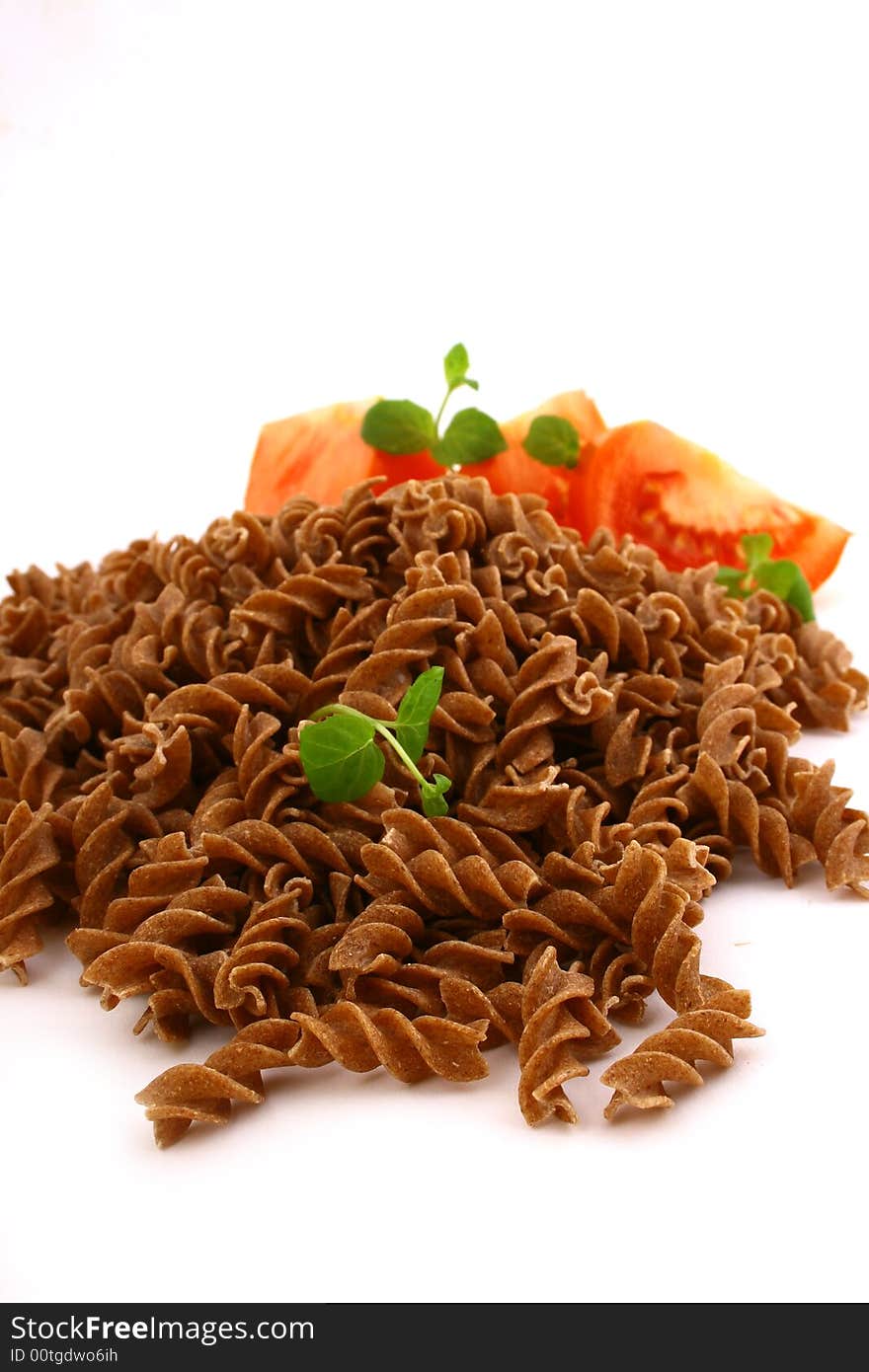 Fusilli twirls pasta Italian food background