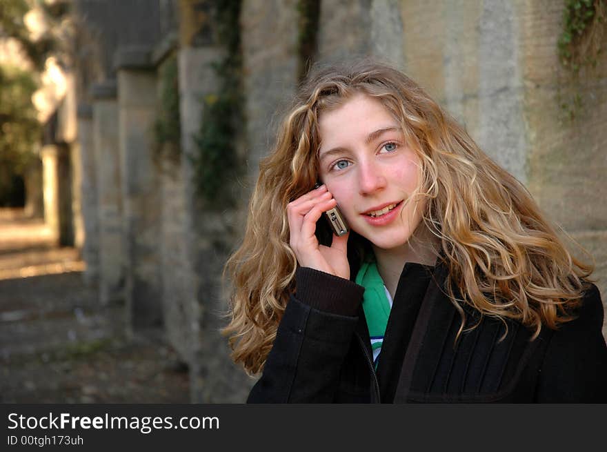 Pretty Teenager On Mobile Phone