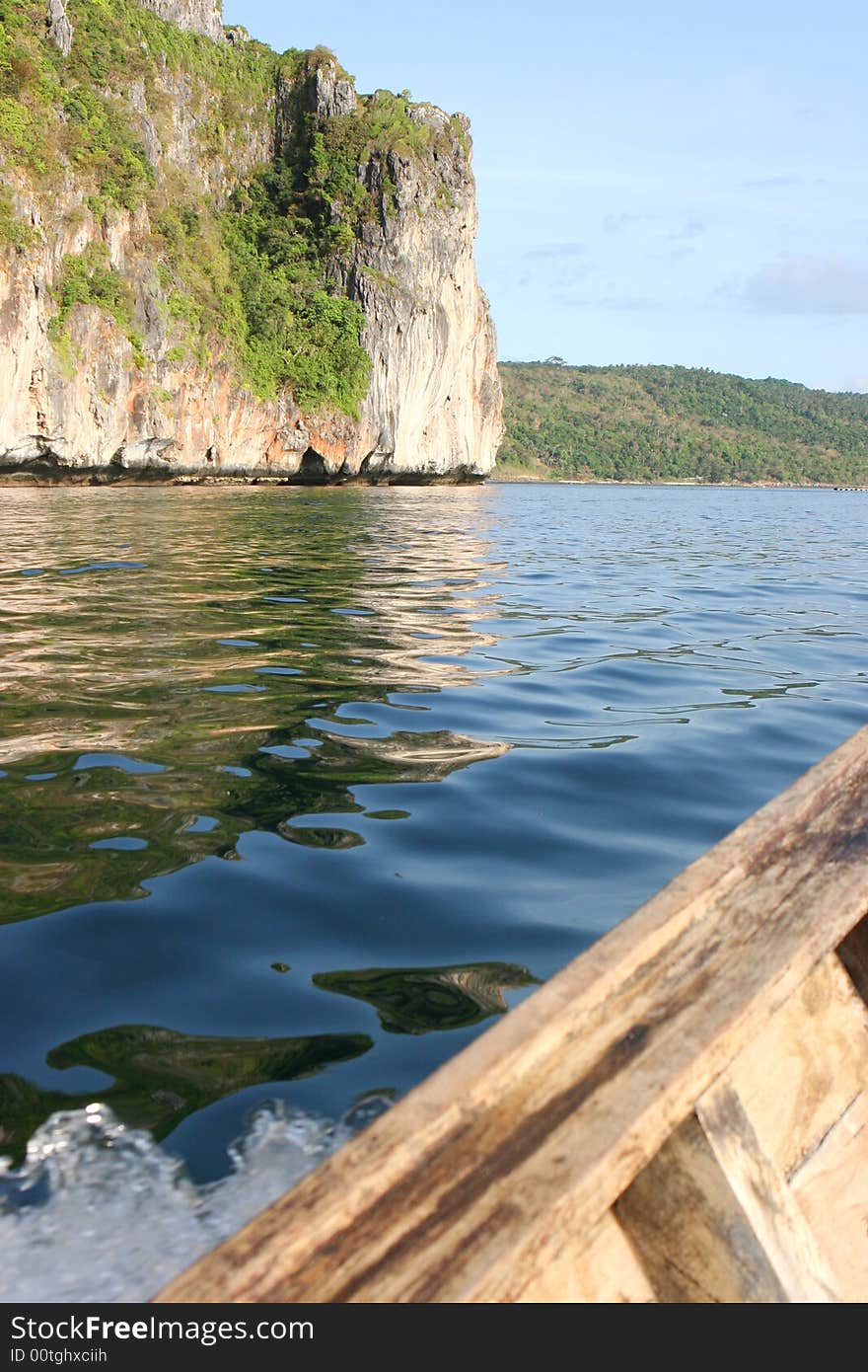 View from a boat of mountains and water. View from a boat of mountains and water.