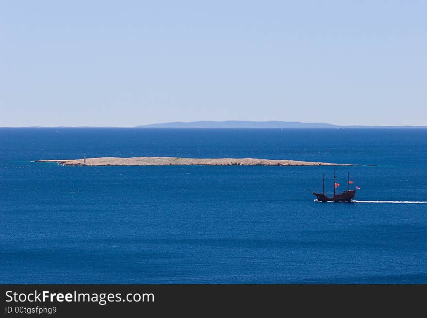 Little island with wood ship