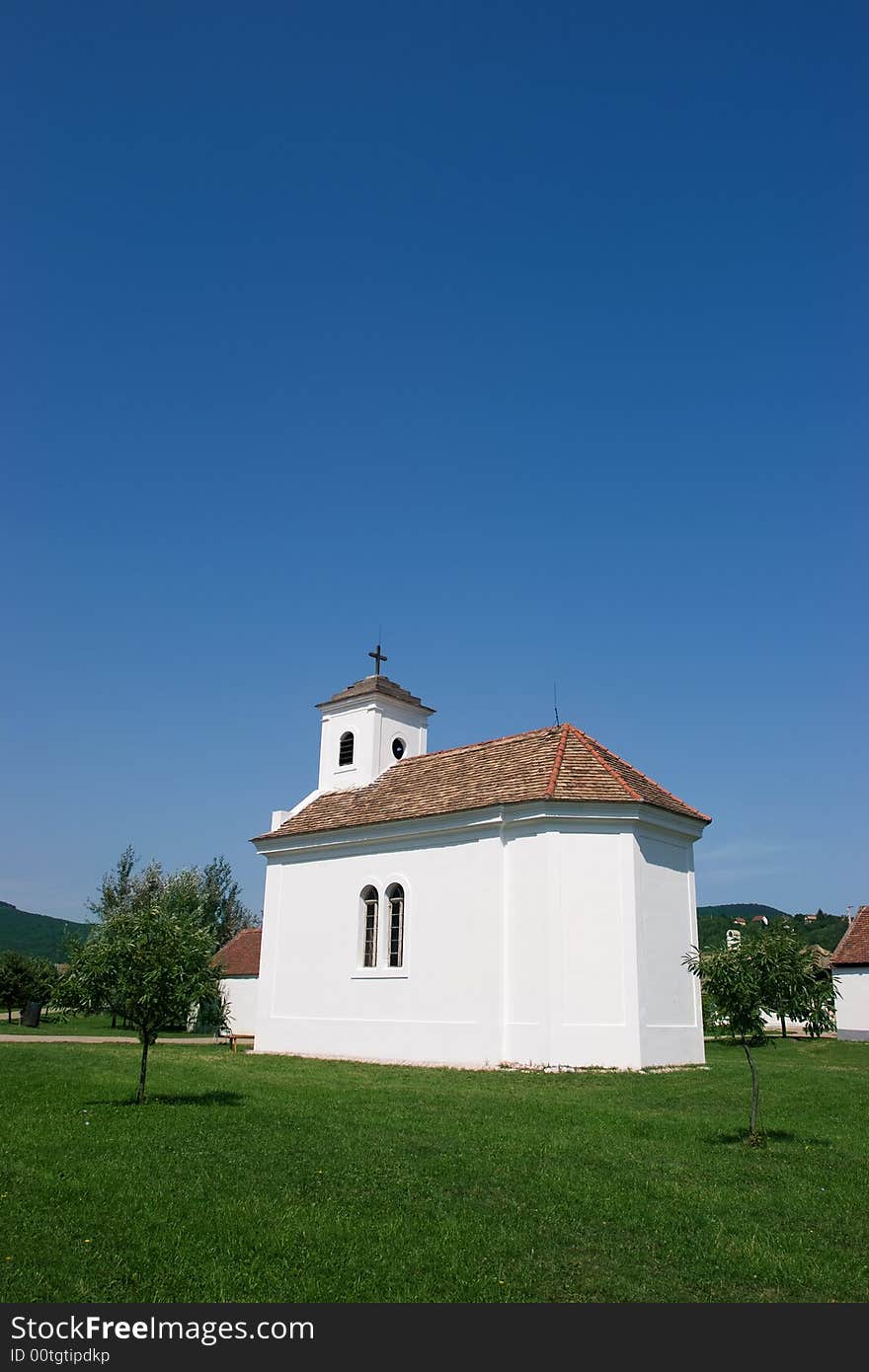 Old little church with blue sky