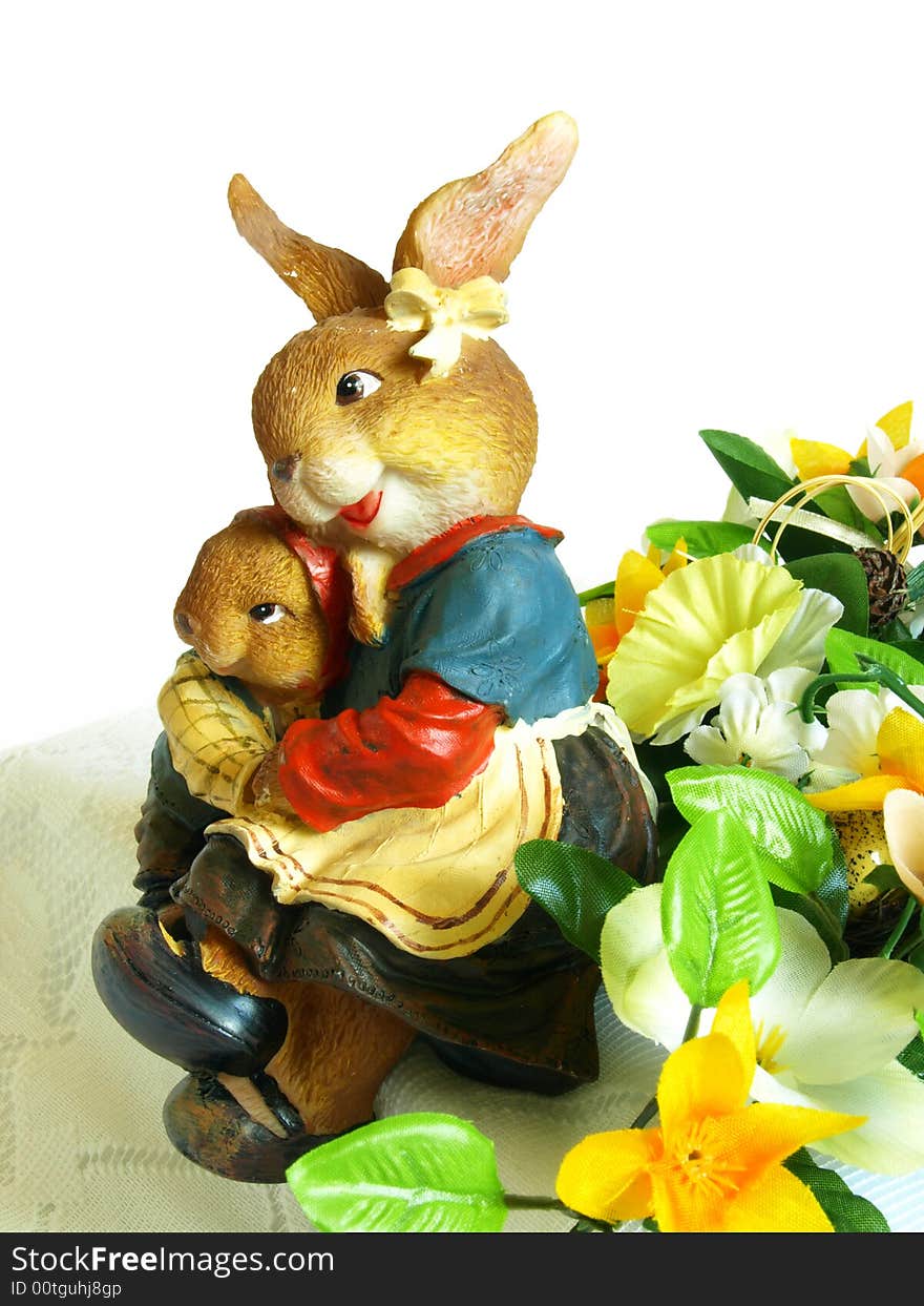 Photo of porcelain easter bunnies on white background