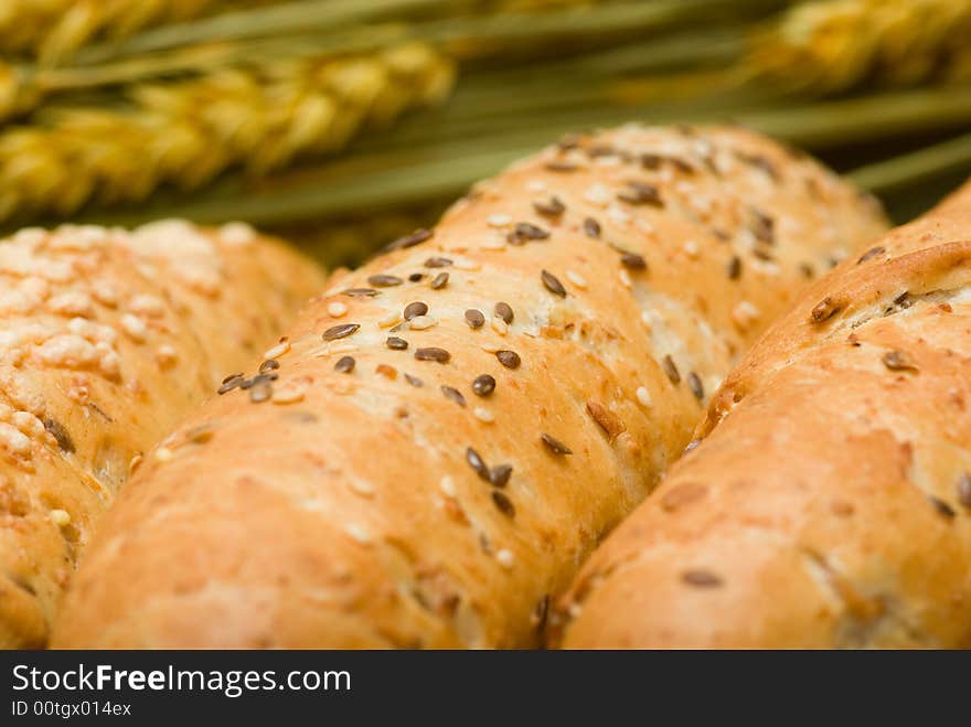 Three bread roll in flat basket and crop