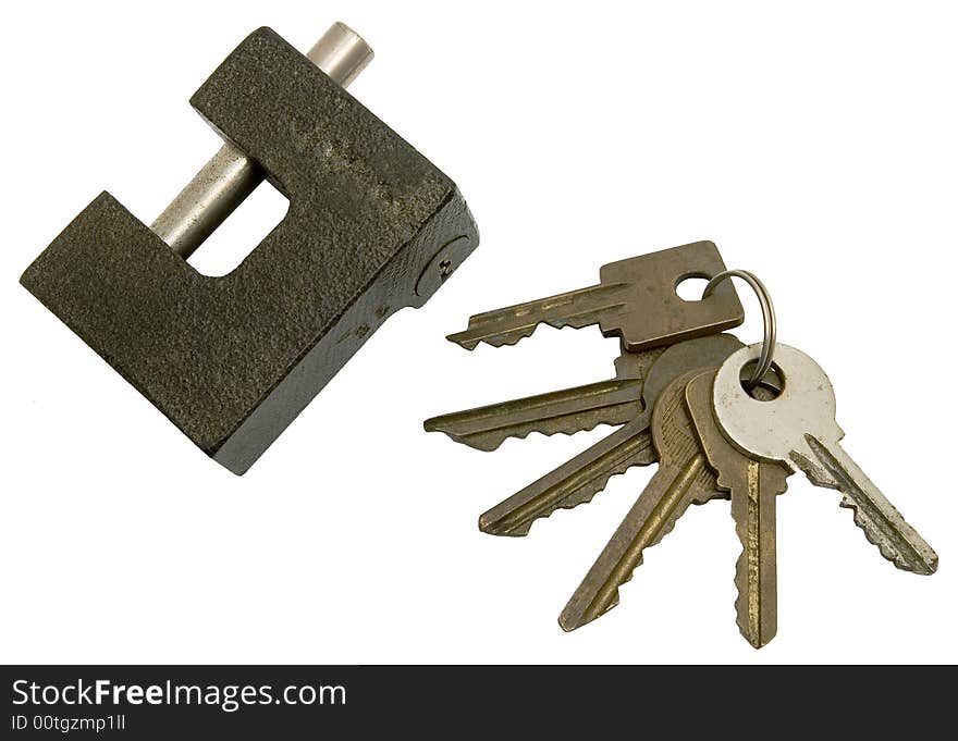 The lock and sheaf of old keys on a white background.