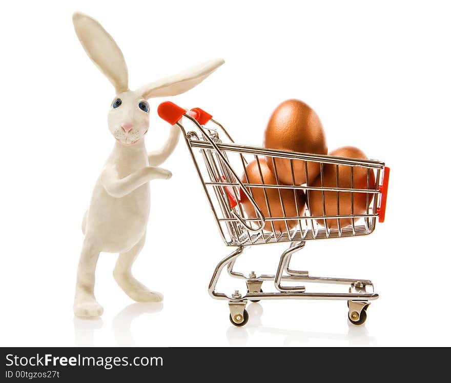 Easter rabbit carries the cart with gold eggs. Easter rabbit carries the cart with gold eggs