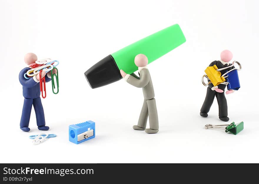 Plasticine human figures humorously handling office objects on white background. Plasticine human figures humorously handling office objects on white background