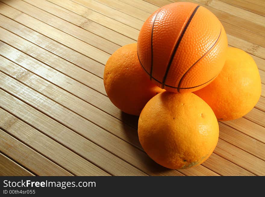 A basketball and orange citrus