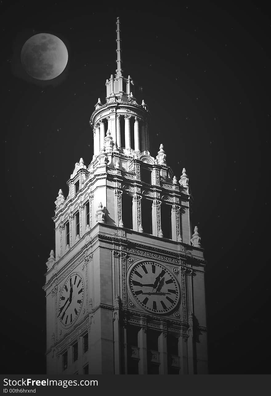 Moonlight illuminating an old city clock tower. Moonlight illuminating an old city clock tower.