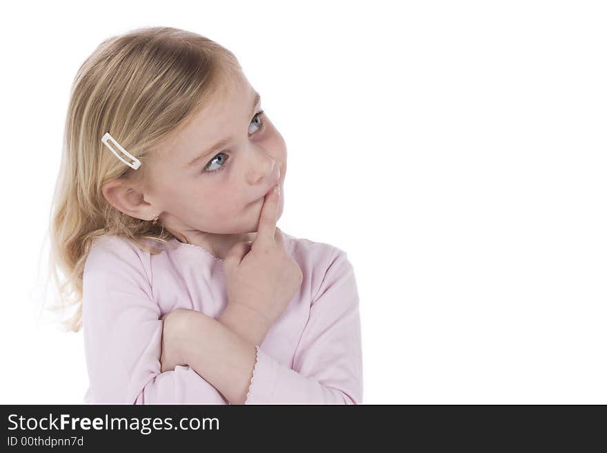 Cute girl dressed in pink shirt, thinking