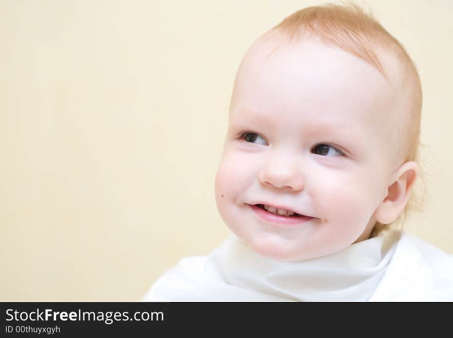 Young boy before first haircut. Also look like preparing for eating.