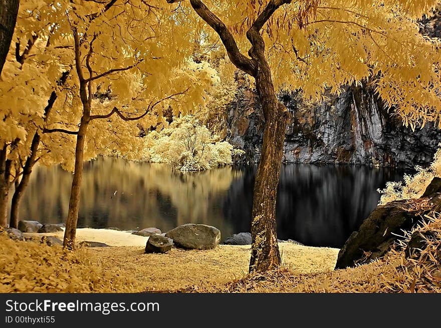 Infrared photo – lake, rock, reflection and tree