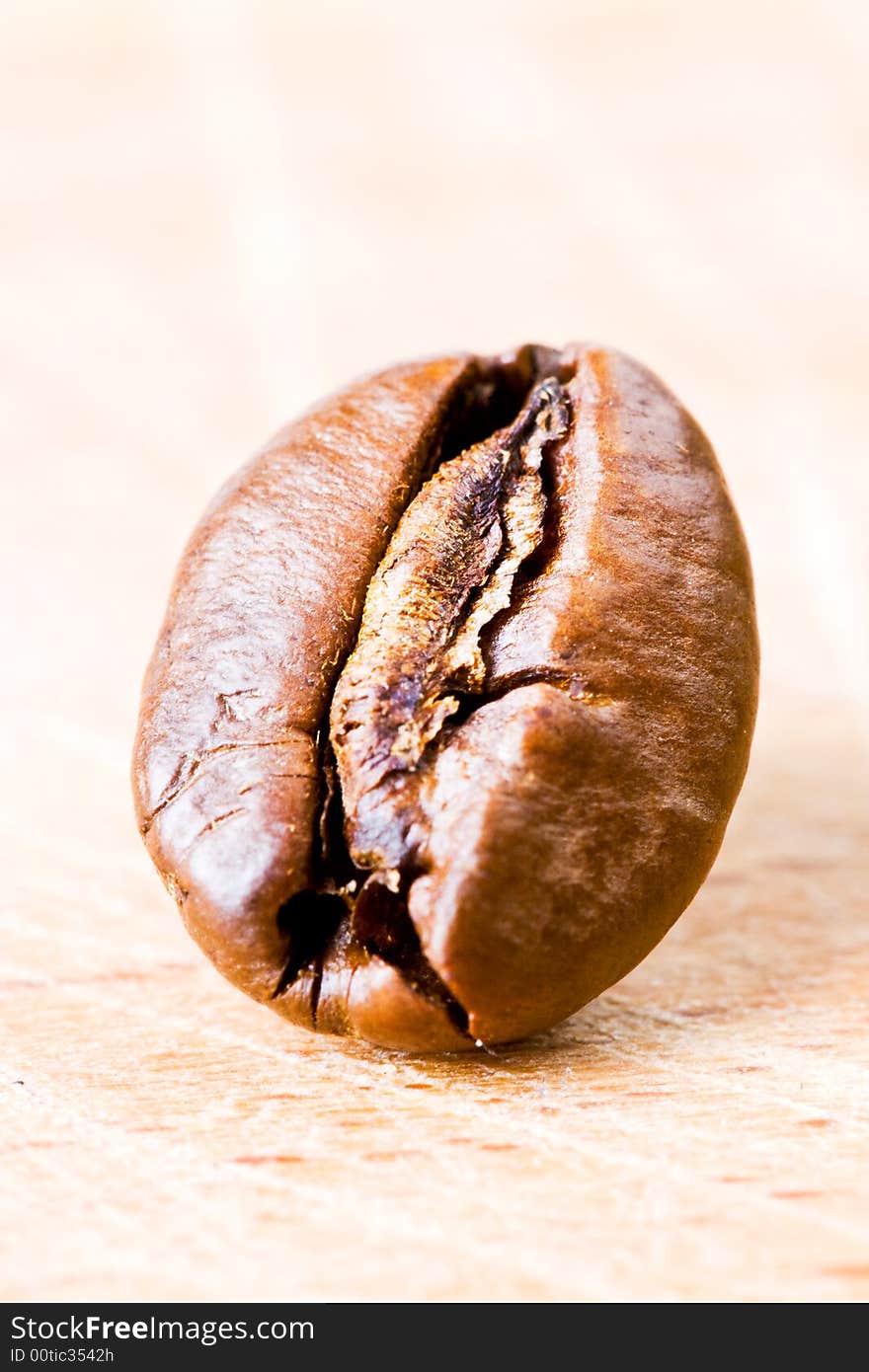 Coffee bean on a wooden surface. Coffee bean on a wooden surface