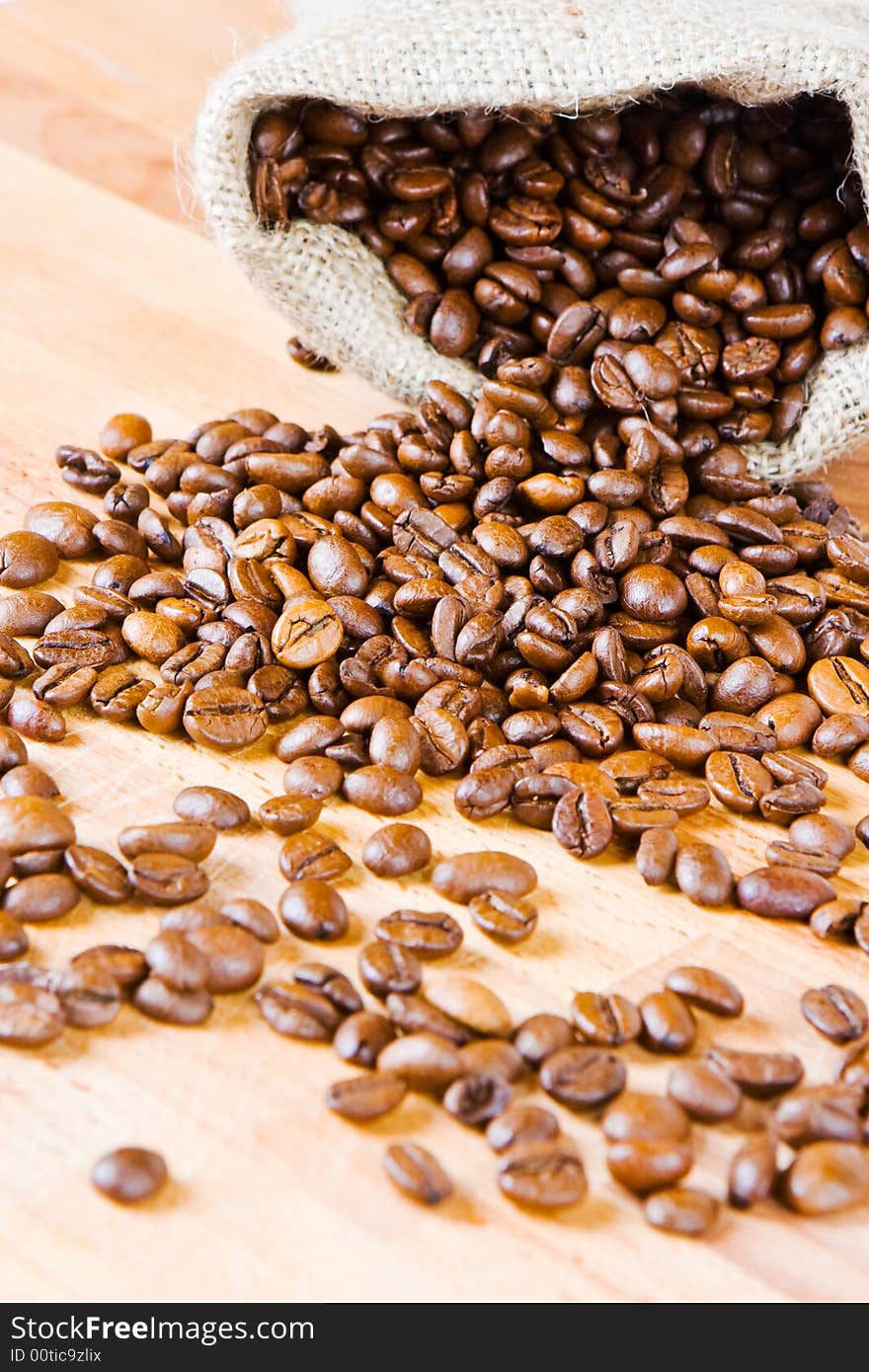 Coffee beans on a wooden board