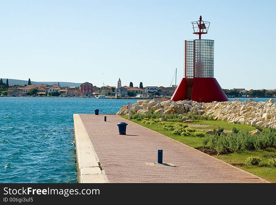 Lighthouse at the morning coastline gorizontal view