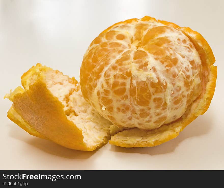 The whole ripe cleared tangerine with a peel