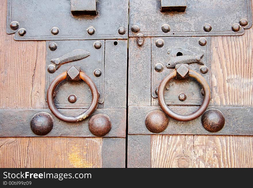 Old Chinese brown door with metal ring. Old Chinese brown door with metal ring