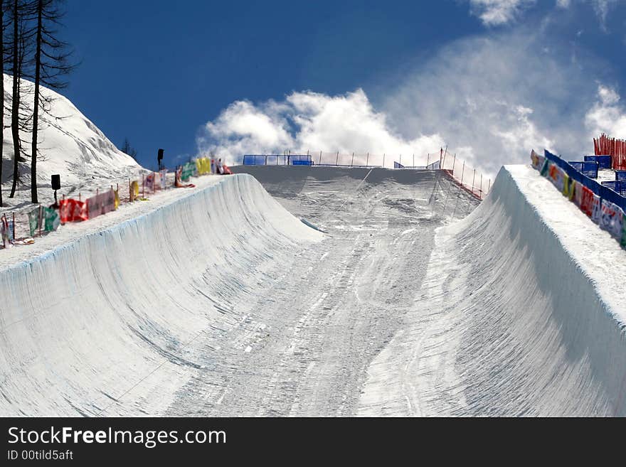 Skiers and snowboarders in ski area. Skiers and snowboarders in ski area