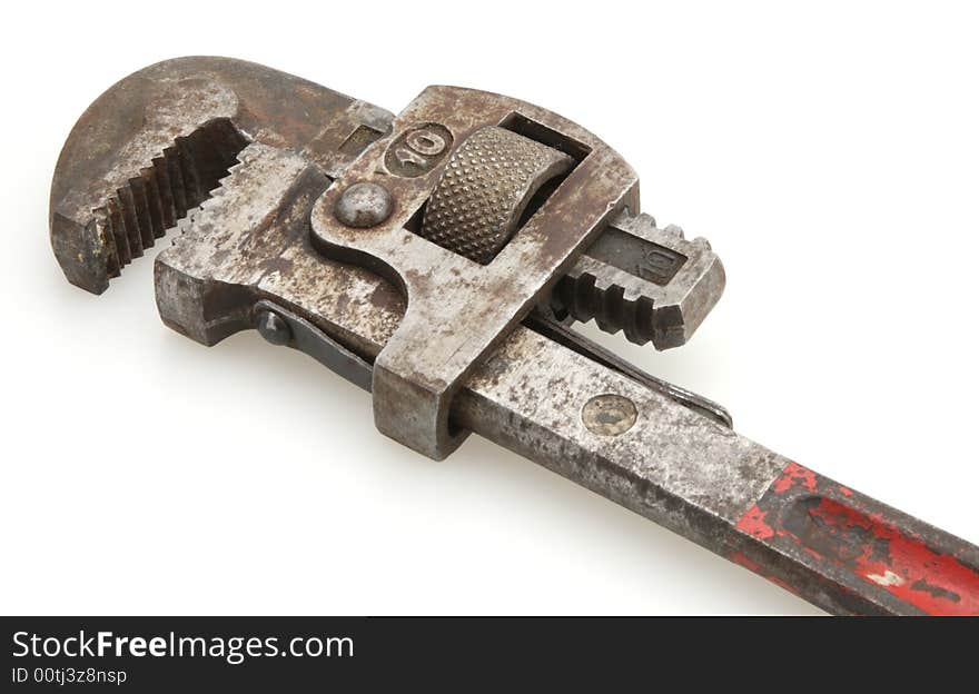 Old Vintage red handled plumbers pipe wrench. Old Vintage red handled plumbers pipe wrench