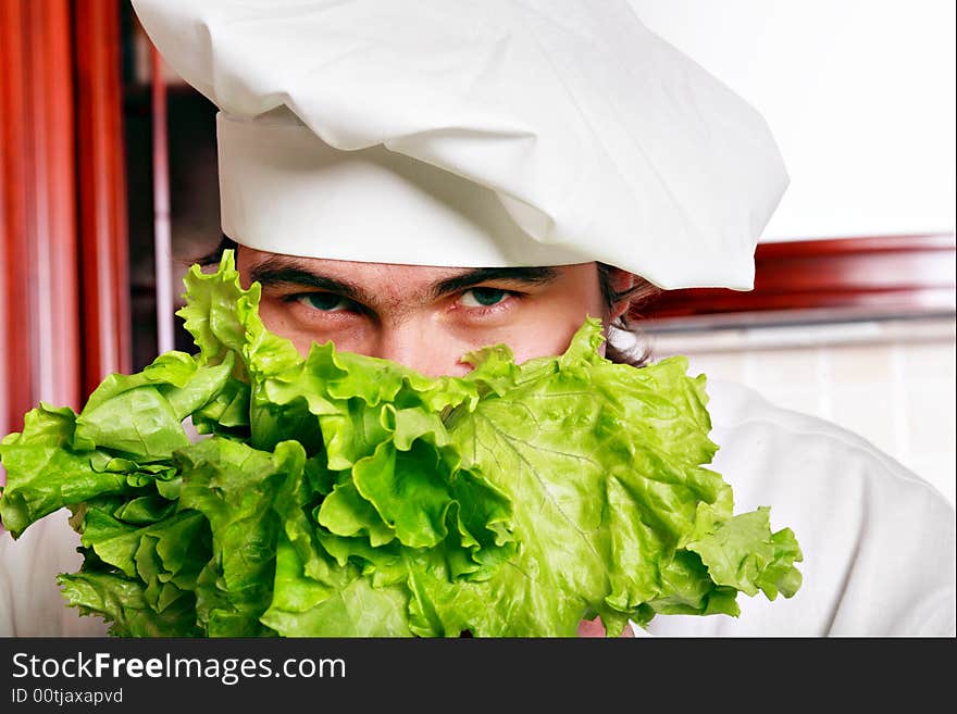 Cook cooking on the kitchen. Cook cooking on the kitchen