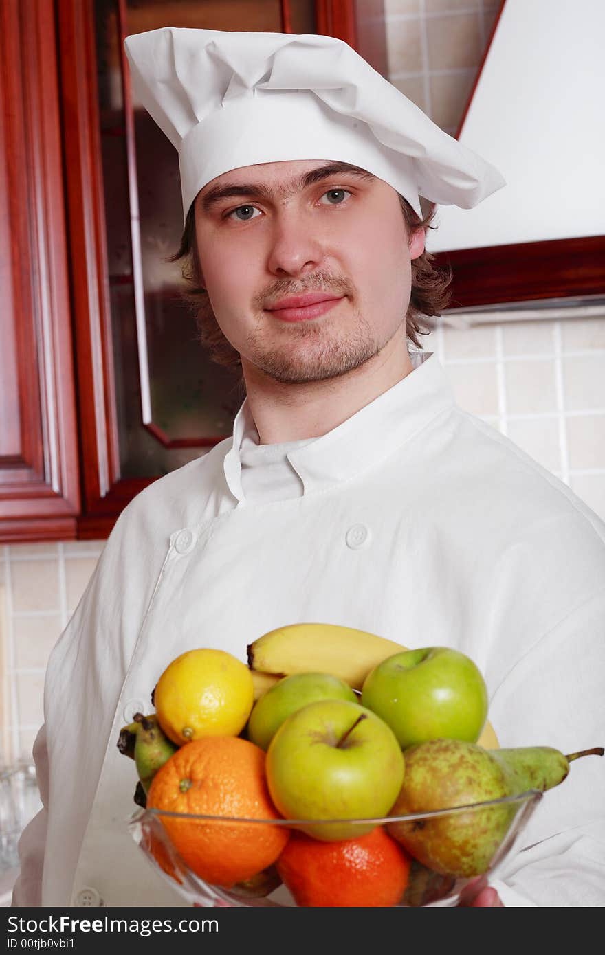 Cook cooking on the kitchen. Cook cooking on the kitchen