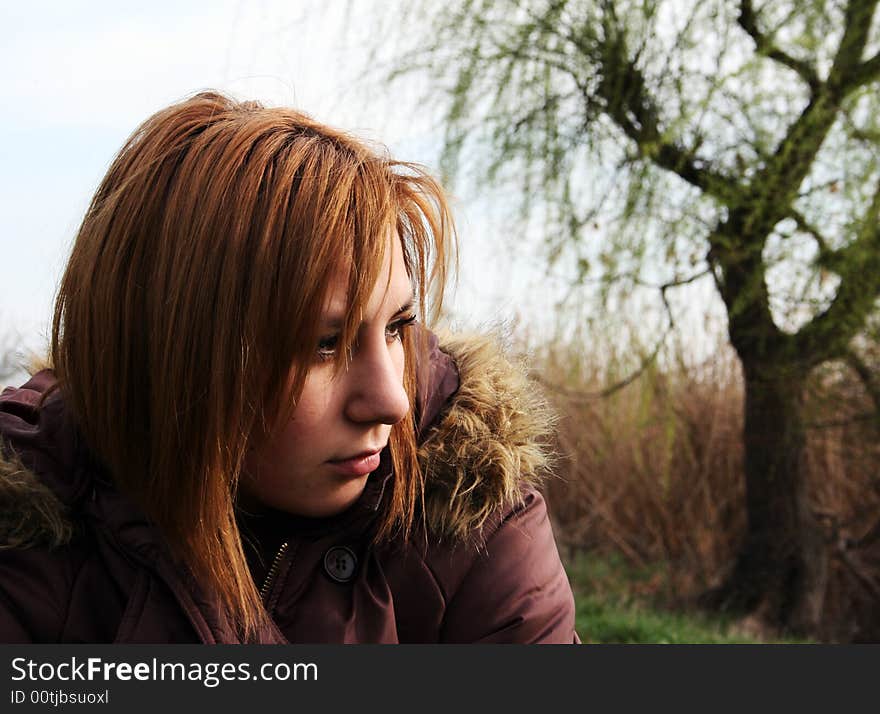 Portrait of a beautiful girl in a park