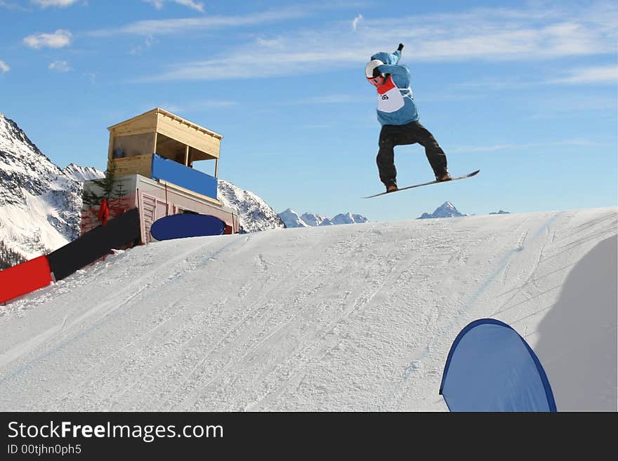 Snowboarder jumping high in the air