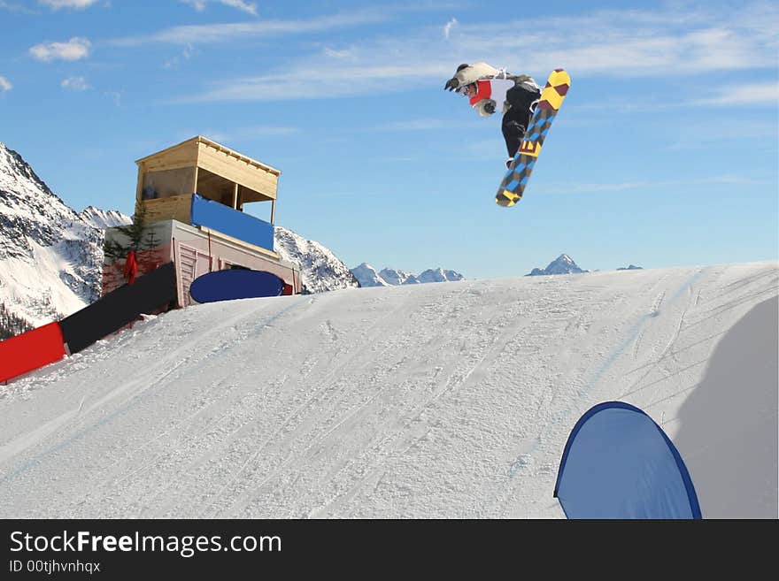 Snowboarder jumping high in the air