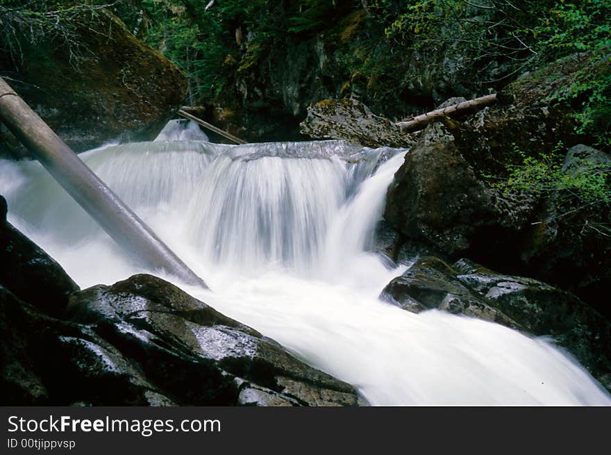 Waterfall And Log