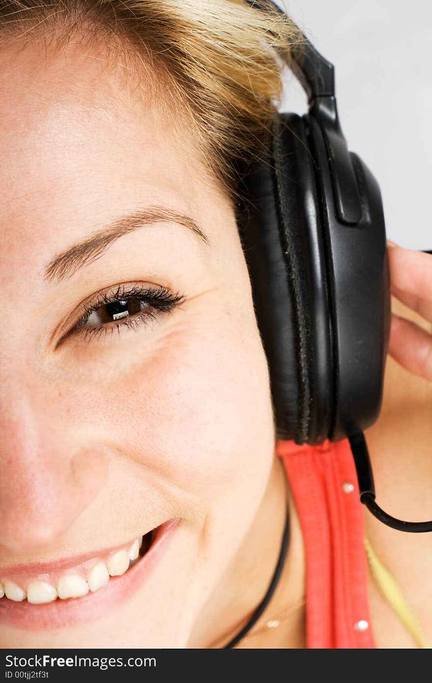 Beautiful woman with headphones listening music