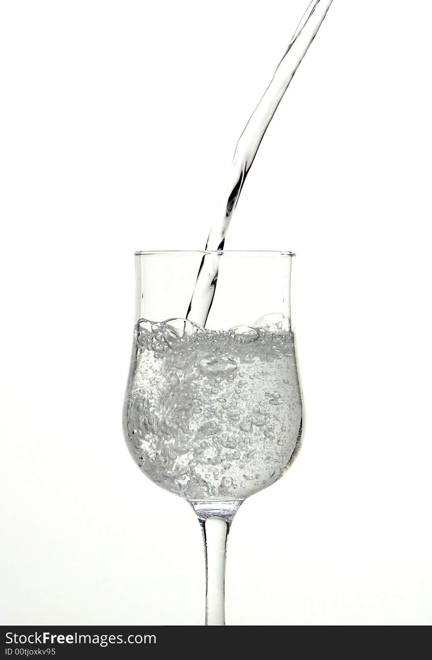 Water Pouring Into Wine-glass