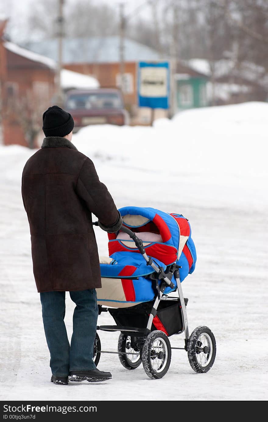 Father with baby stroller